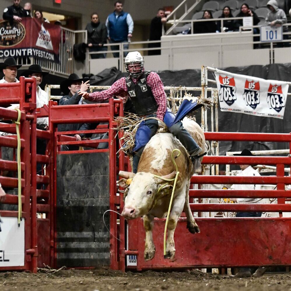 PRCA photographer Chuck Minor captures Mason Moody's 85 point ride in Bismarck, ND on Friday February 7th